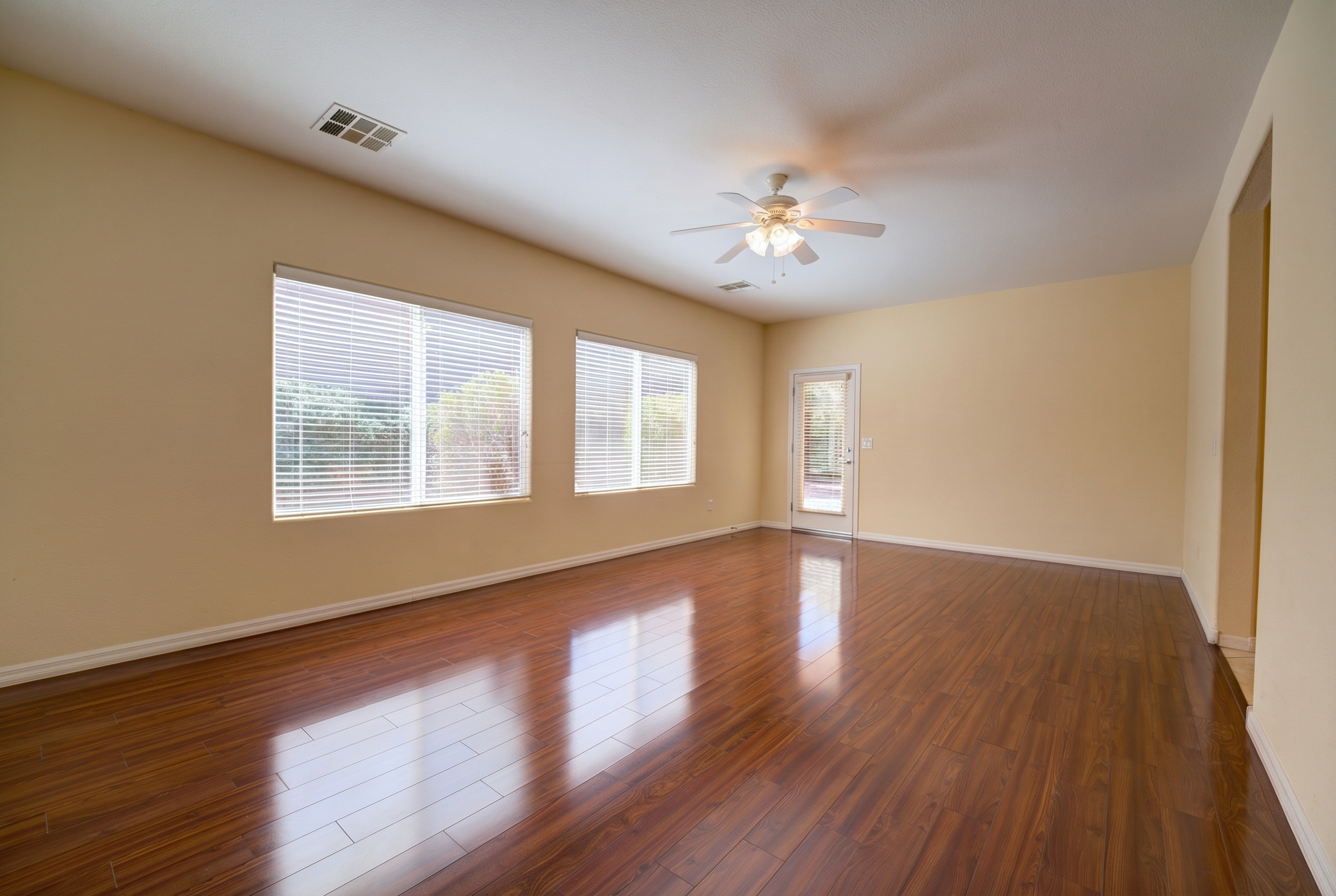 Primary bedroom with hardwood floors